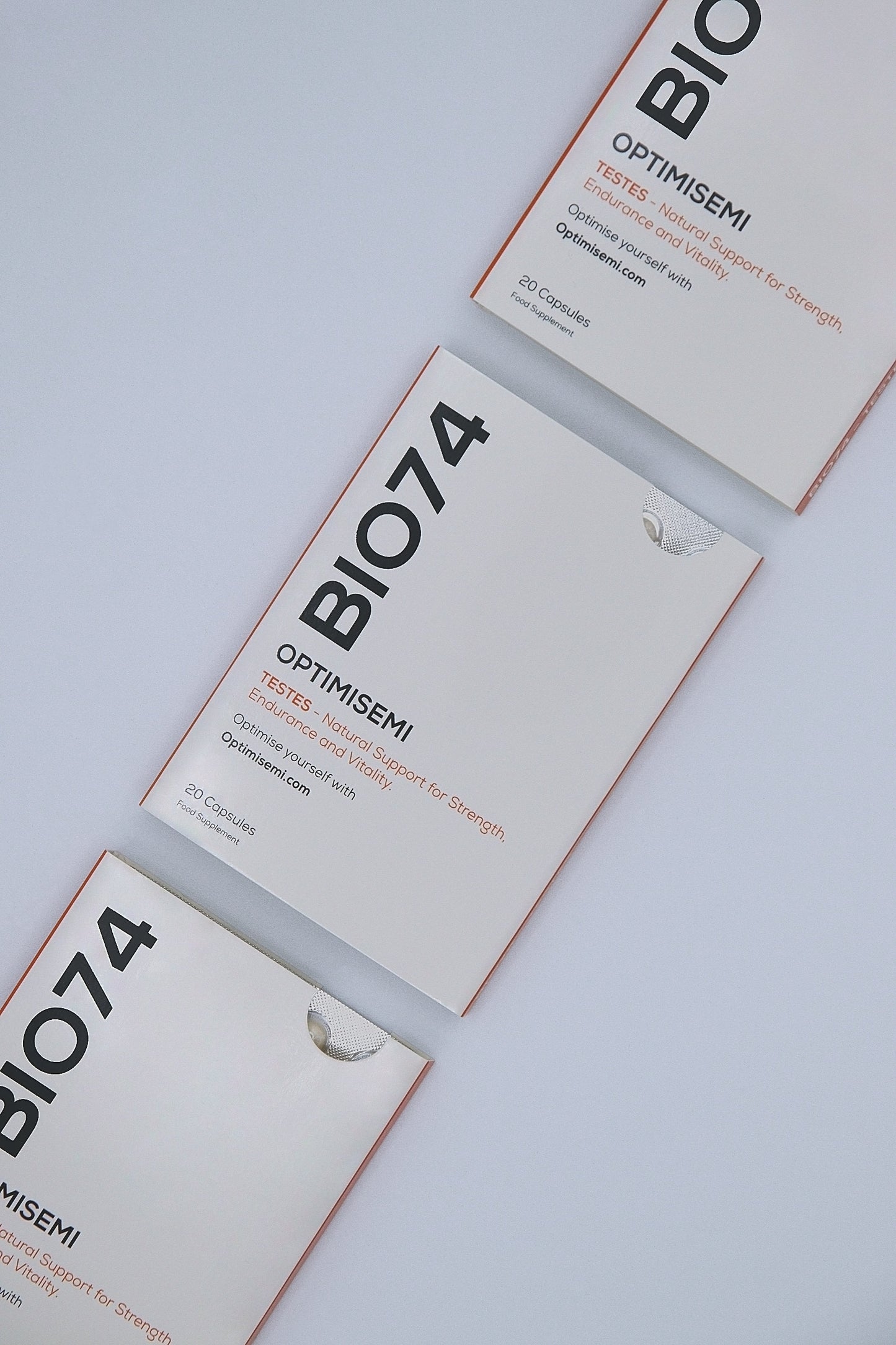 Image showing three BIO74 Testes supplement boxes arranged diagonally at a 45 degree angle from top to bottom. Each box reads: TESTES - Natural Support for Strength, Endurance and Vitality. Contains 20 supplement capsules. Supplement.