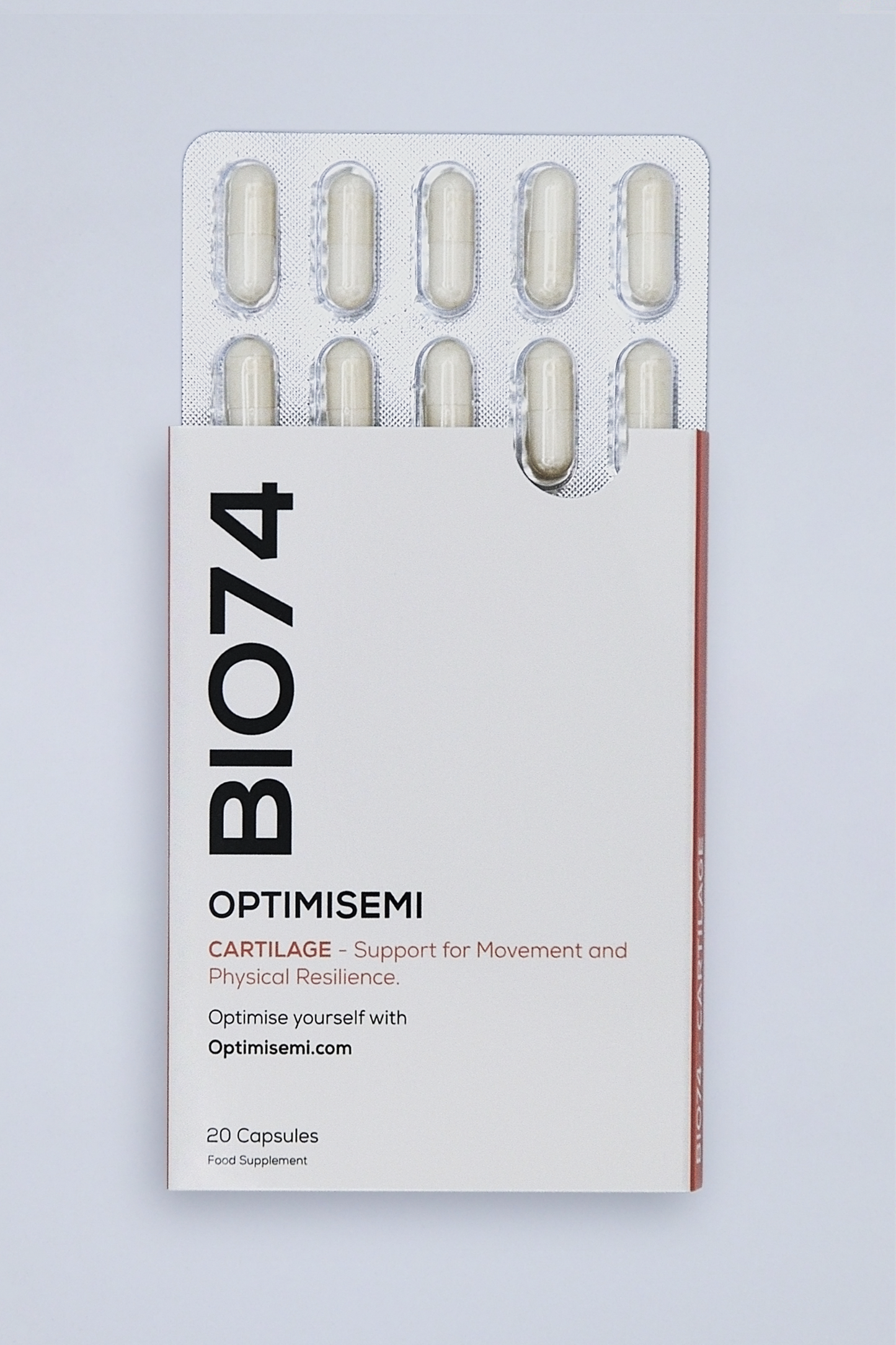Image shows a blister pack of BIO74 OPTIMISEMI, a cartilage support supplement with 20 capsules, designed to aid movement and physical resilience. The clean, modern packaging emphasizes health and wellness.